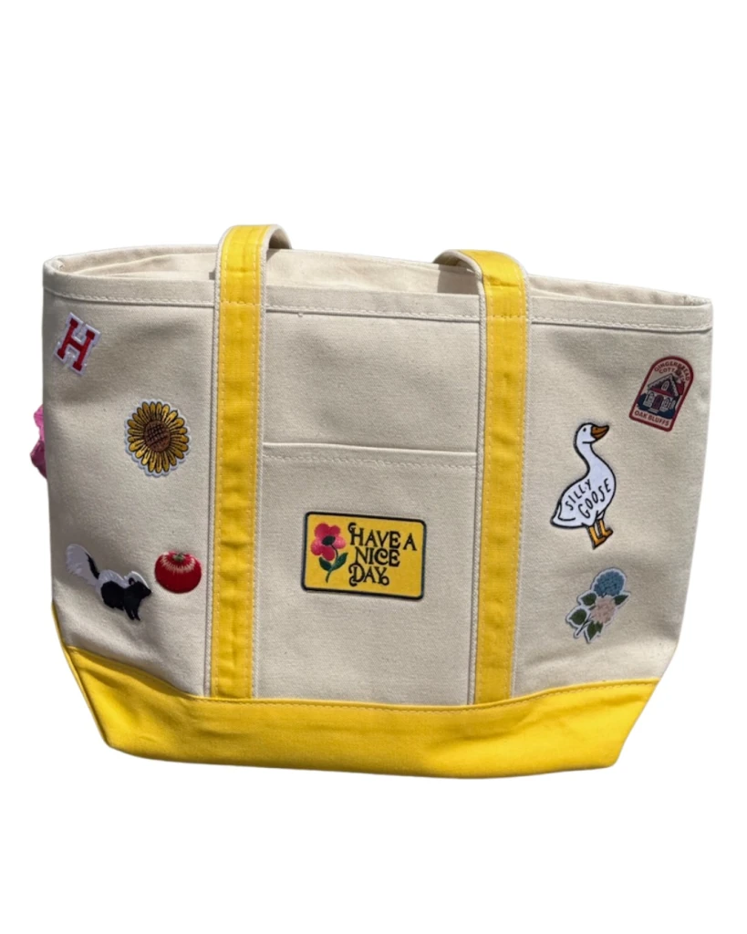 Iron-on patch collection display at Toteally Yours Studio, Oak Bluffs